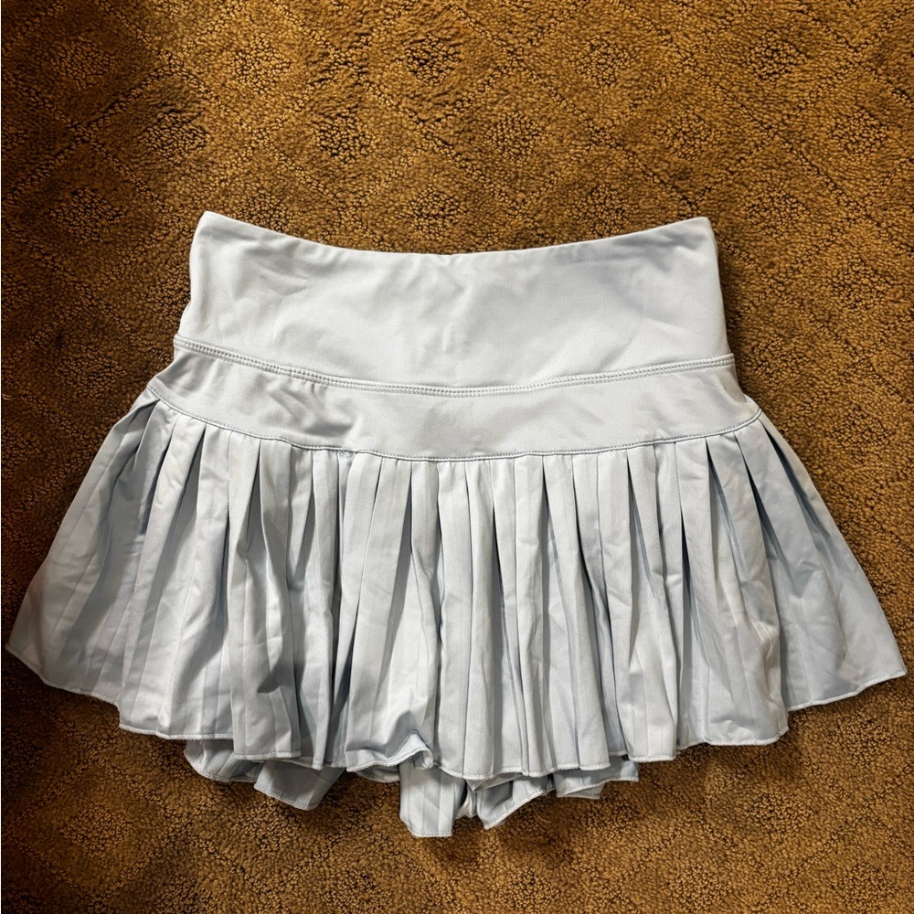 Gold hinge light blue skirt